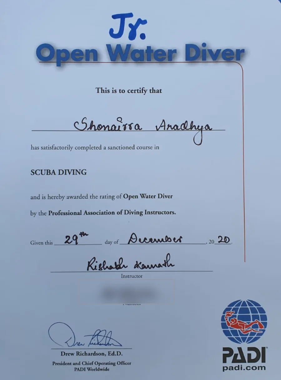 PADI Junior Open Water Diver certificate, 29 December 2020. The certification number is redacted.